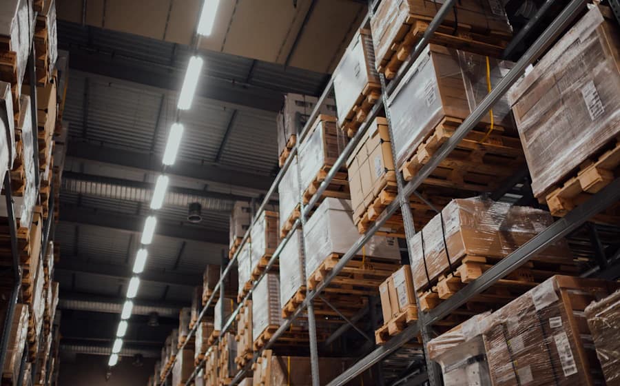 Rows of shelving in an industrial warehouse used for compliance and storage audits
